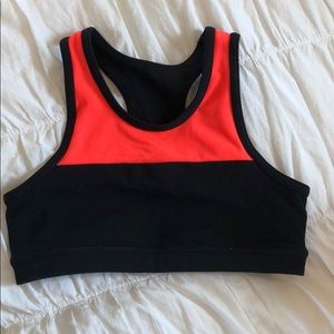 Bright pink/orange and black Sports bra